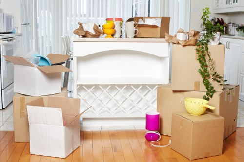 Unpacking household items into a new Greenwich home room by room