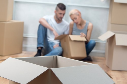 Local moving team handling furniture in Greenwich