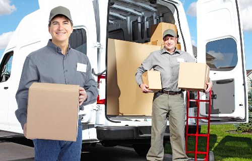 Loading furniture safely into a Greenwich moving truck