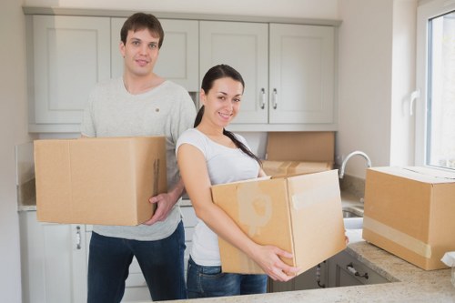 Commercial relocation equipment and labelled boxes for Greenwich businesses